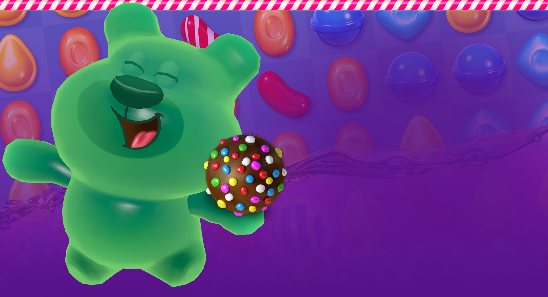 Ein Gummibärchen hält eine Farbbombe.