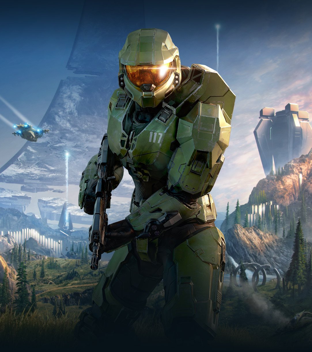 Halo Infinite, 뒤에 부서진 Halo 링이 있는 무성한 계곡에서 앞을 향하고 있는 Master Chief의 애니메이션